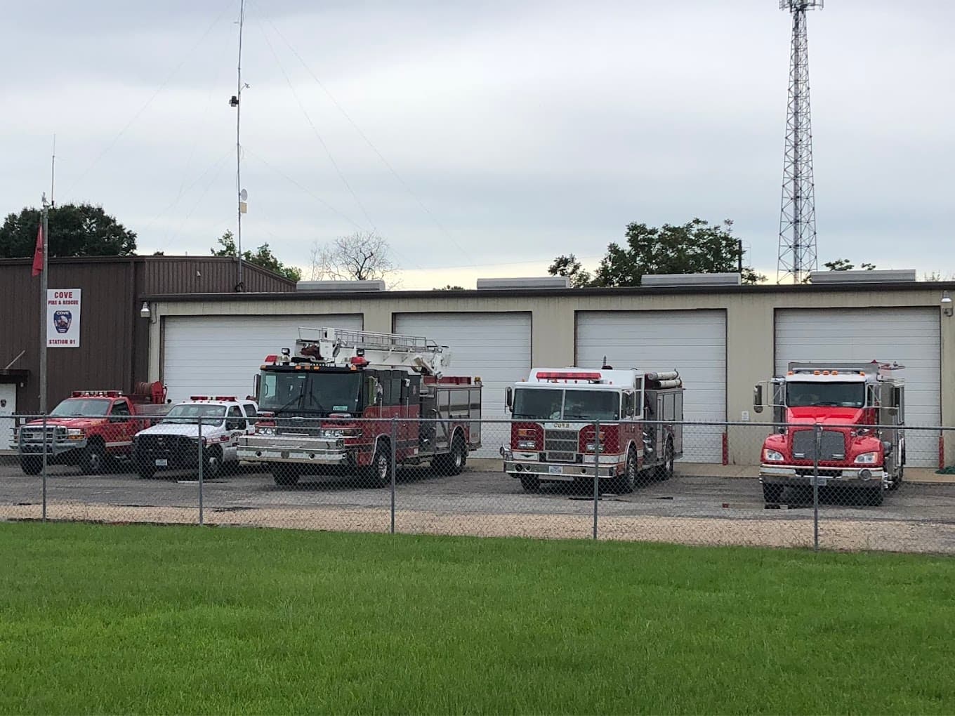 Cove Fire & Rescue Station 91 — fire engines and support vehicles parked in front of the station bays in Cove, Texas.